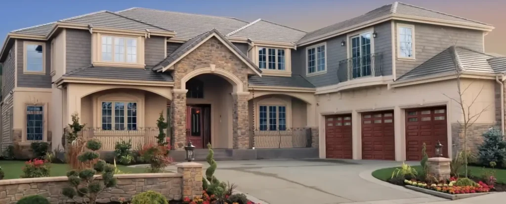 Luxurious modern home with stone facade, pristine landscaping, and large wooden garage doors.